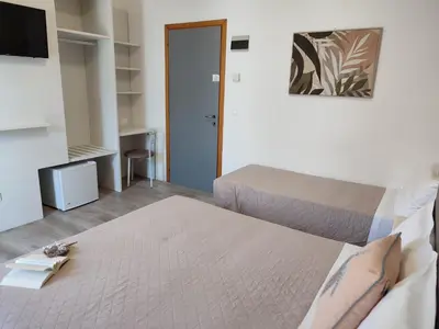 Letto o letti in una camera di Hotel Madera
