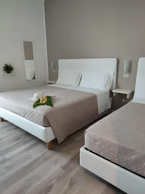 Letto o letti in una camera di Hotel Madera