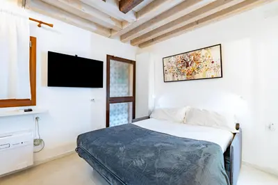 Letto o letti in una camera di Recreate Studio - Biennale