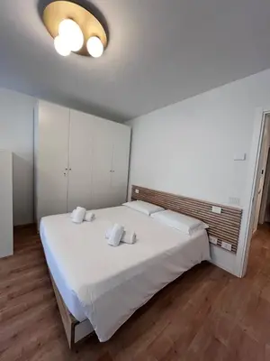 Letto o letti in una camera di Residenza Urania