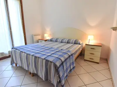 Letto o letti in una camera di Apartment Solmare-29 by Interhome