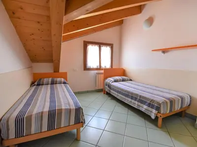 Letto o letti in una camera di Apartment Solmare-29 by Interhome