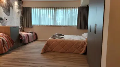 Letto o letti in una camera di fragilerooms