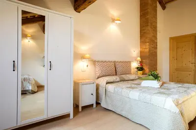 Letto o letti in una camera di Agriturismo Ae Cavane