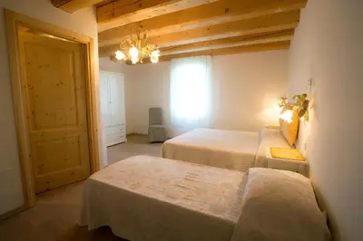 Letto o letti in una camera di Agriturismo Ae Cavane
