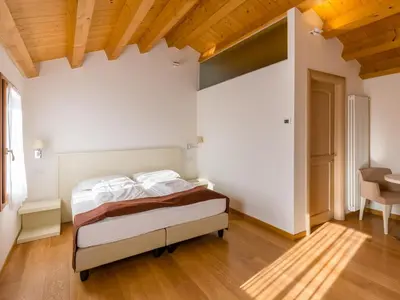 Letto o letti in una camera di Tenuta Sant'Eufemia