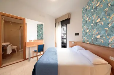 Letto o letti in una camera di Hotel El Salvador Frontemare Piscina Riscaldata