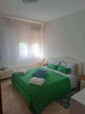 Letto o letti in una camera di La Casetta di Ugo