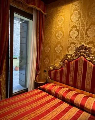 Letto o letti in una camera di Ca' San Zaccaria