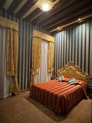 Letto o letti in una camera di Ca' San Zaccaria