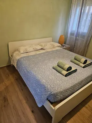 Letto o letti in una camera di Camera Matrimoniale