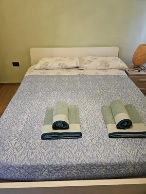 Letto o letti in una camera di Camera Matrimoniale