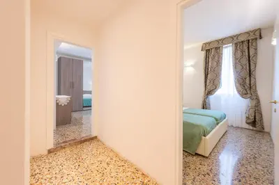 Letto o letti in una camera di Ca' Dorè