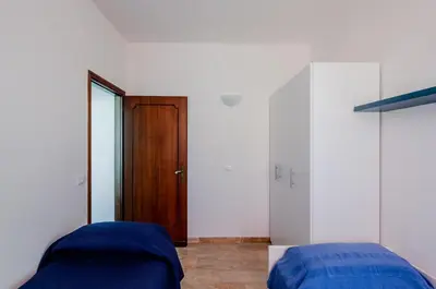 Letto o letti in una camera di GuestHost - Zagar House-Venice Airport Close-by Apt W Parking
