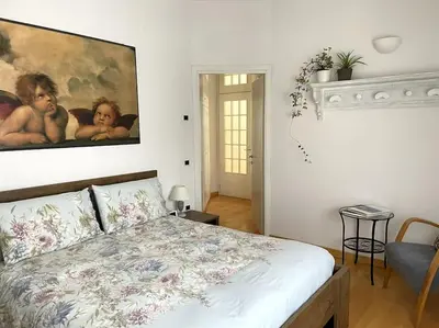 Letto o letti in una camera di spazio ellero