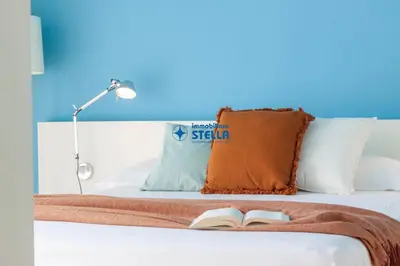 Letto o letti in una camera di Golf Jesolo Village
