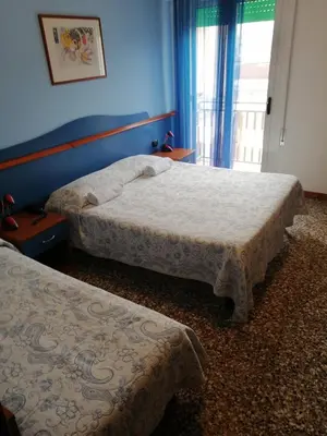 Letto o letti in una camera di Hotel Trifoglio
