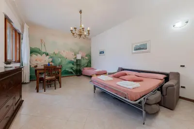 Letto o letti in una camera di Gate2-MarcoPoloAirport-2 camere da letto-Wifi-Netflix-15' da Venezia