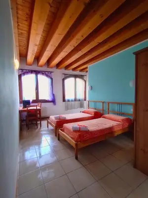 Letto o letti in una camera di Quadrifoglio Relax