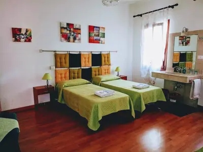 Letto o letti in una camera di Casa Favaretto Guest House