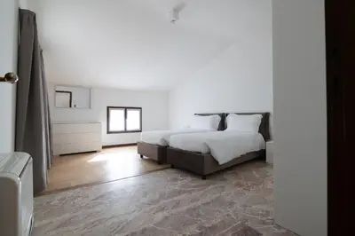 Letto o letti in una camera di Residenza Corso Palladio 159