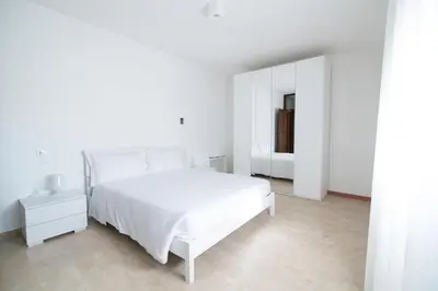 Letto o letti in una camera di Residenza Corso Palladio 159