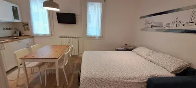 Letto o letti in una camera di Casa Carlotta al Portello, vicino al centro e all'ospedale