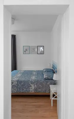 Letto o letti in una camera di Casa Carlotta al Portello, vicino al centro e all'ospedale