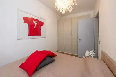 Letto o letti in una camera di Appartamento Best Forcellini
