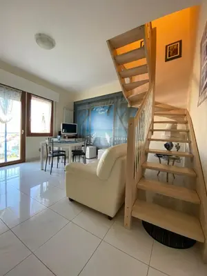 Area soggiorno di Fairmont Residence Elisabetta by Ca-Sa Check