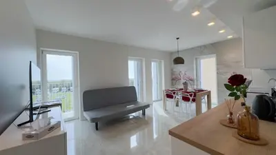 TV o dispositivi per l'intrattenimento presso Fairmont Seafront Flamingo Suite by Ca-Sa Check
