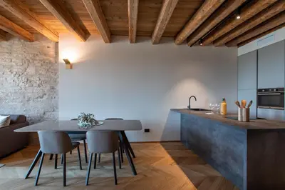 Cucina o angolo cottura di Palazzo CarpeDiem- Stay in the Heart of Prato della Valle