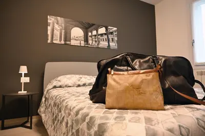 Letto o letti in una camera di Ca' Milla Apartment Noale Centro Storico