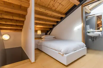 Letto o letti in una camera di The Silk House by LionHost