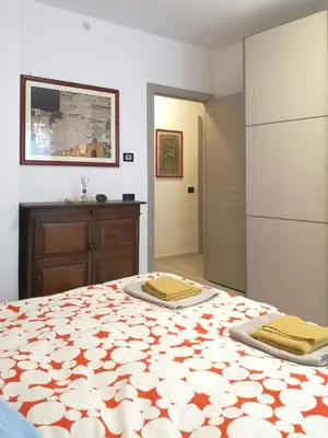 Letto o letti in una camera di Casa Venezia e Riviera