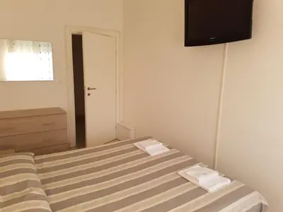 Letto o letti in una camera di Sottomarina Beach Life