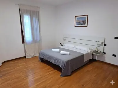 Letto o letti in una camera di Ca' Piave