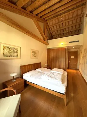 Letto o letti in una camera di Campus San Francesco