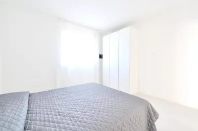 Letto o letti in una camera di L14 Apartments