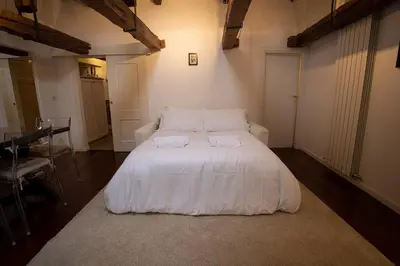 Letto o letti in una camera di Ca' Regina