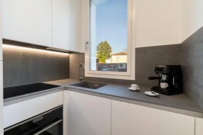 Cucina o angolo cottura di Palazzo Ruzante Padova - Atene Apt
