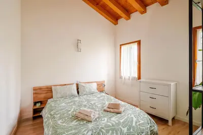 Letto o letti in una camera di Ca Mantoet - 3Bedroom Loft