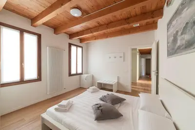 Letto o letti in una camera di Dimora Acquamarina