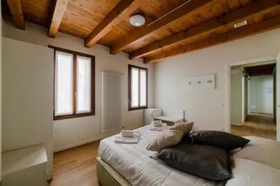 Letto o letti in una camera di Dimora Acquamarina