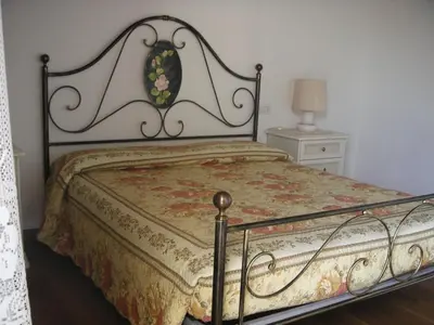 Letto o letti in una camera di Agriturismo Due Torri