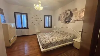 Letto o letti in una camera di APPARTAMENTO PANORAMICO