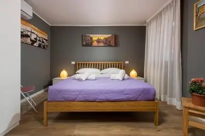 Letto o letti in una camera di Biennale Comfort House - modernità a Castello