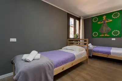 Letto o letti in una camera di Biennale Comfort House - modernità a Castello