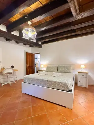 Letto o letti in una camera di Casa Alleria Venezia Cozy Apartment by Rialto Bridge