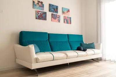 Area soggiorno di Sun Beach Residence con Piscina - Piazza Brescia - Adria Holiday Jesolo - FAMILY APARTMENTS